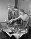 Cynthia Brants painting in her art studio. by Key Herbert