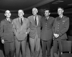 Air Academy Board. Left to right: Lieutenant General H. A. Harmon, General Carl Carl Spaatz, Doctor Bruce Hopper, Lieutenant Colonel Arthur E. Boudreau and Captain Jack E. Womack