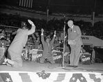 Amon G. Carter, Bob Hope, and Les Brown during a show for Carswell Air Base personnel