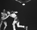 Frank Dunnagan and Benard Smith at welter weight Golden Gloves duel by Al Panzera