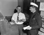 Traffic Officer H. O. Glass with Corporation Court Clerk Walter Paschal