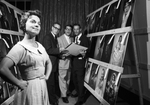 Southwestern Photographers Association. Ernie Curtis, Offie Lites and LaVerne Friesen study Mrs. Frances Leiper