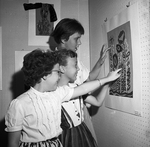 Fort Worth Art Center. Elementary School art exhibit. Cynthia Purselley, Margaret Purselley, and Elizabeth Rowell look at exhibits