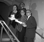 Mr. and Mrs. Thornton Lloyd, Mr. and Mrs. Aubrey L. Strother attend "La Boheme"