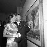 Captain Allan Fleming and Mrs. Fleming with Navy Pictures