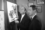 Ace Reid, and Harvey Cox display cartoon feature