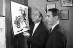 Ace Reid, and Harvey Cox display cartoon feature