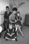 Mrs. Robert W. Chambers, with children Christopher, Melissa, and Jennifer