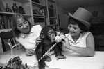 American Field Service; Dominique Leblanc, and Ines Capero with "Tiffany," the chimpanzee by Ron Heflin
