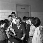 Mrs. Alliene Mullendore with students who have fathers in Vietnam