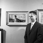 John Chumley with painting titled "Lupita"