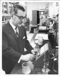 Dr. O. A. Battista working in a laboratory in 1971