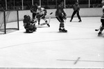 Ice hockey action; Fort Worth Wings vs. Dallas Black Hawks by Willis Knight