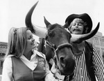 Kathy Marcum and Kirk Walden with UTA mascot, the Maverick horse