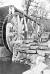 Icy gristmill water wheel at the Log Cabin Village by Ron Heflin