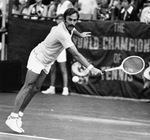 John Newcombe leans into backhand return at Colonial Country Club National Invitational Tennis tournament by Skeeter Hagler