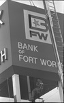 A close up of sign being put in place for Bank of Fort Worth