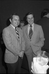 CBS News White House correspondent Bob Schieffer (left) stops at Sigma Delta Chi journalism chapter meeting to speak to former professor, Dr. Warren K. Agee, 11/07/1975