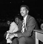 Dunbar High School basketball coach Robert Hughes during the city championship game by Willis Knight