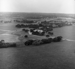 High aerial of the 140-acre Davis' Stonegate Mansion, 4200 Mockingbird Lane, Fort Worth, Texas by Ron Heflin