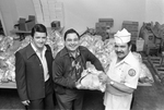 Raul Jimenez holds one of the turkeys that will feed senior citizens of Fort Worth for Thanksgiving in the Jimenez Restaurant