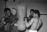 Lawson brothers get pointers for Golden Gloves bouts from their coach Frankie Karr by Al Panzera