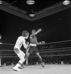 Golden Gloves Regional high school match with lightweight Clyde Lawson of Dunbar High School (right) against Ted Sims of Richland High School by Al Panzera