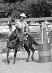 Rider on horseback practicing for Juneteenth festival's rodeo and parade