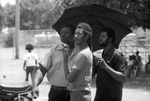Perciel Johnson, Alfred Malone, and Frederick Battles watching a softball game on Juneteenth at Sycamore Park