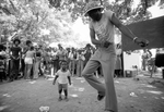 People dancing to music at Sycamore Park during Juneteenth festivities