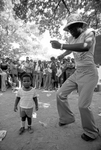 People dancing to music at Sycamore Park during Juneteenth festivities