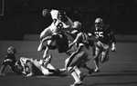 University of Arkansas quarterback #18 Ron Calcagni in game against Texas Christian University (T. C. U.)