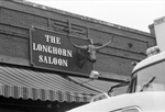 Sign for The Longhorn Saloon by Gene Gordon