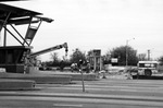 Dismantling toll booths at the closure of the Dallas-Fort Worth Turnpike