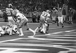 Dallas Cowboys vs. Denver Broncos at Super Bowl XII in New Orleans, Cowboys running back Tony Dorsett scores touchdown by Al Panzera