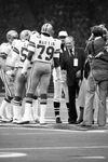 Dallas Cowboys vs. Denver Broncos at Super Bowl XII in New Orleans, coin toss with Red Grange by Al Panzera