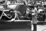 Women working in General Motors' Arlington assembly plant by Tony Record