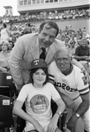 Texas Rangers' owner Brad Corbett with Mike Stuart (center), local Arthritis Foundation poster child, and Texas Rangers' manager Billy Hunter (right), 07/10/1978