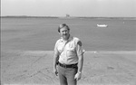 Richard Simpson, standing in front of Lake Arlington