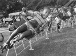 Lisa Jackson on swing ride at Sycamore Park during the 1979 Juneteenth Celebration