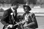 UTA's 1980 Homecoming Queen Wanda Jo Holiday with Homecoming King Rodney Lewis by Jerry W. Hoefer