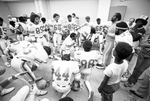 Players in locker room, Texas Wranglers vs. San Antonio Charros football game by Paul Moseley