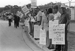 PATCO strike; air traffic controllers picket near fence at DFW Airport FAA tower by Dale Blackwell