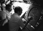 Air traffic controllers at the Fort Worth Air Route Traffic Control Center by Rodger Mallison