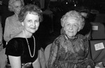 The Assembly Ball, Ridglea Country Club; two seated women (not identified). by Rodger Mallison