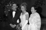 The Assembly Ball, Ridglea Country Club; debutante Donna Aline Wood with couple (not identified). by Rodger Mallison