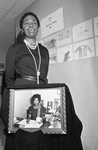 Erma D. Lewis, with Portrait of Bertha Collins