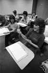 Hearing-impaired student signs during class by Jerry W. Hoefer