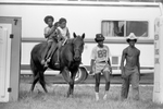 Attendees of Juneteenth festivities at Booker T. Washington Park at Lake Mexia by John Costello