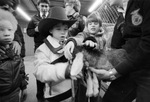 Visually impaired children pet a goat at the Stock Show in Fort Worth by Mario Villafuerte